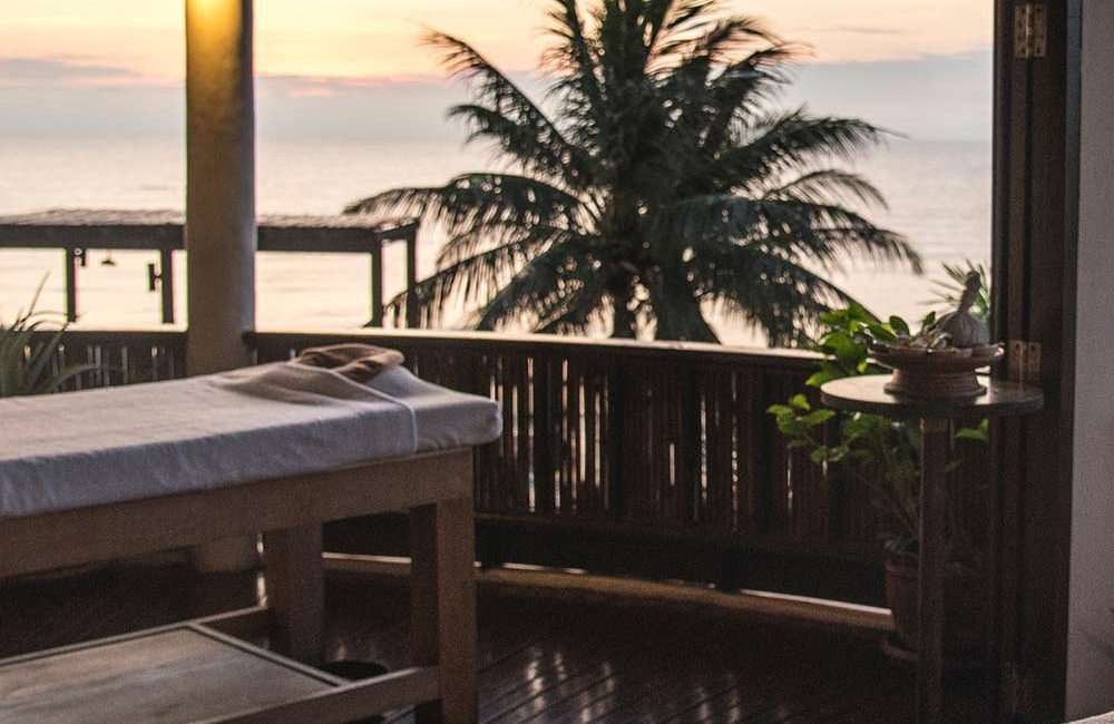 A view of the ocean from a bed room.