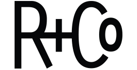 A black and white image of the letters r + c